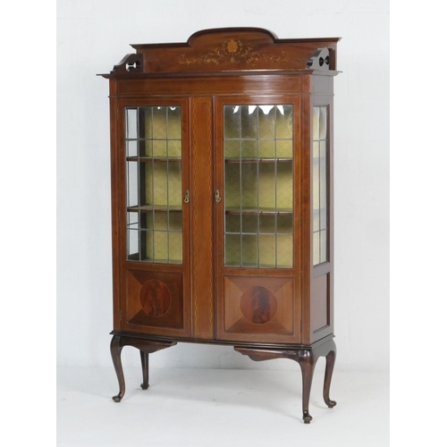 873 - Edwardian mahogany and inlaid bow front display cabinet, circa 1905, the top with foliate inlays in ... 