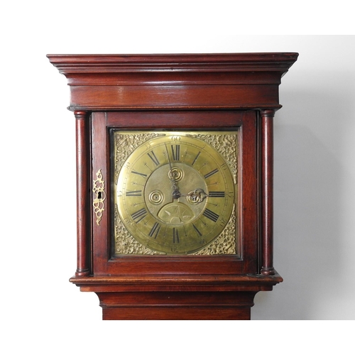 877 - Walnut 30 hour longcase clock, 18th Century, with a brass 11 inch dial with matted centre and date a... 