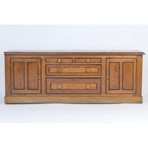 911 - Victorian pitch pine dresser, late 19th Century, fitted with two central short drawers and two long ... 