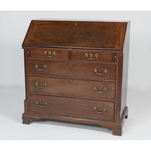 915 - George III mahogany bureau, circa 1780, the slope front opening to an attractive configuration of pi... 