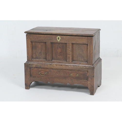 919 - Oak joined cofferbach, 19th Century, with lift up lid over a three recessed panel front, single long... 