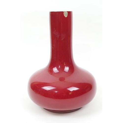 92 - Bernard Moore red flambe vase, of baluster form, marked 'Bernard Moore' (chip to the rim), height 26... 