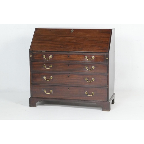 923 - George III mahogany bureau, circa 1770, the slope front opening to pigeonholes and drawers with two ... 