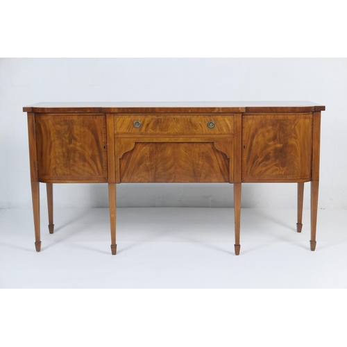 929 - Mahogany and inlaid breakfront sideboard in the Georgian style, Post-War, crossbanded throughout and... 