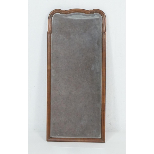 930 - Walnut framed wall mirror, 18th or 19th Century, shaped rectangular form with moulded edge and bevel... 