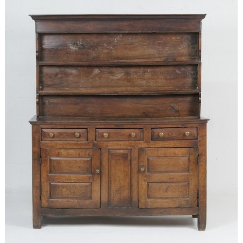 931 - George II oak enclosed dresser and plate rack, North Wales, circa 1720-40, boarded rack with ogee mo... 