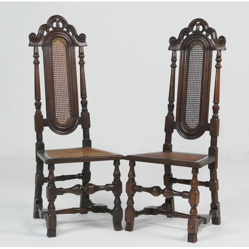 941 - Pair of walnut high back side chairs, late 17th Century with later restorations, arched and scrolled... 