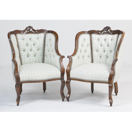 944 - Pair of French walnut and upholstered tub chairs, early 20th Century, deep buttoned back and seat up... 