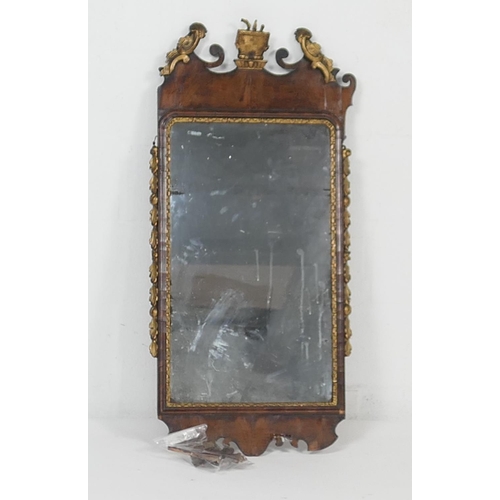 950 - George III walnut and parcel gilt mirror, the plate 72cm x 42cm, the frame extensively damaged and w... 