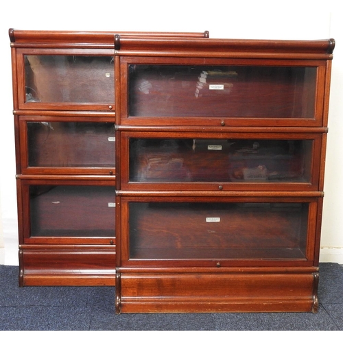 957 - Two Globe Wernicke mahogany three section bookcases, each with up and over glazed doors, on an ogee ... 