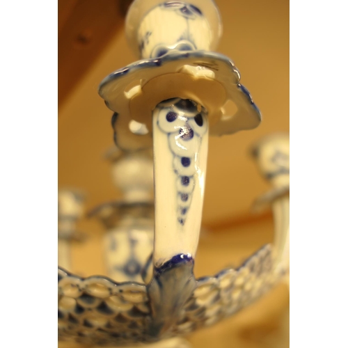 29 - Royal Copenhagen blue and white porcelain table centre, the basket top supporting six candle sconces... 