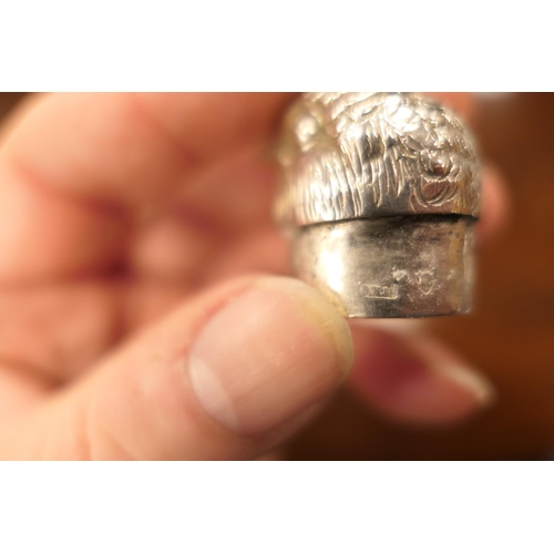 163 - Continental sterling silver novelty pepper pot worked as a swallow,  London import marks for 1913, l... 