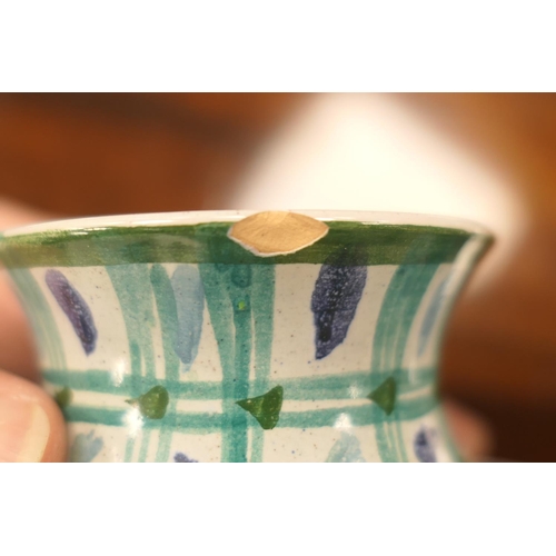 77 - Danish studio earthenware face cup and cover, designed by Bjorn Wiinblad, circa 1975, having a wide ... 