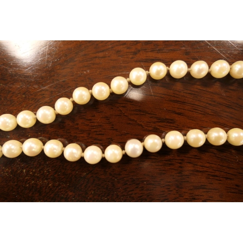 376 - Cultured pearl double strand choker necklace, the pearls of uniform size and colour, united by a pen... 