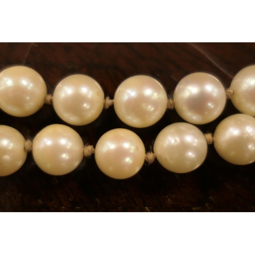 376 - Cultured pearl double strand choker necklace, the pearls of uniform size and colour, united by a pen... 