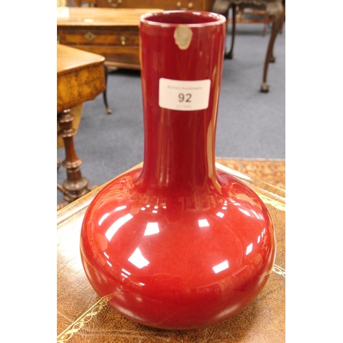 92 - Bernard Moore red flambe vase, of baluster form, marked 'Bernard Moore' (chip to the rim), height 26... 