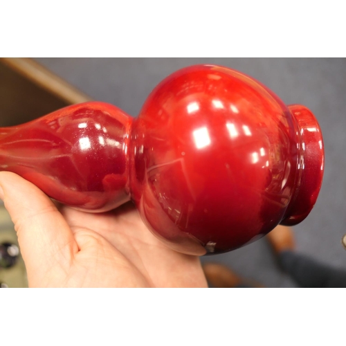 96 - Pair of Bernard Moore red flambe double gourd vases, one numbered 1069 (restored at the neck), the o... 