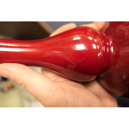 96 - Pair of Bernard Moore red flambe double gourd vases, one numbered 1069 (restored at the neck), the o... 