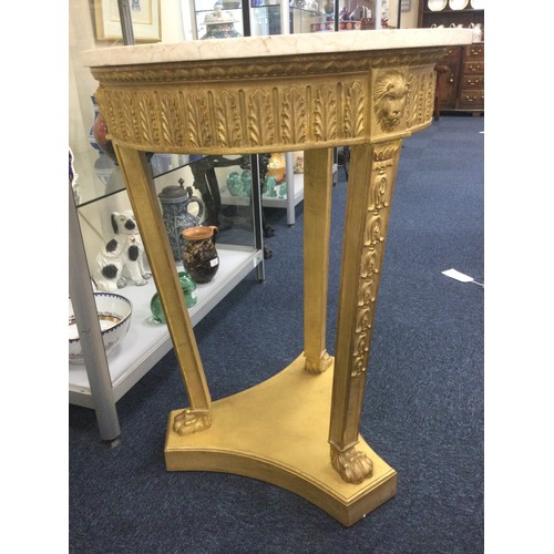 906 - Regency style marble and giltwood circular table, late 20th Century, circular top over an acanthus f... 