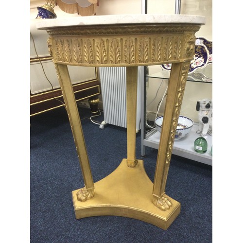 906 - Regency style marble and giltwood circular table, late 20th Century, circular top over an acanthus f... 