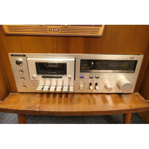 670 - 1960s walnut stereo cabinet enclosing a Garrard model 301 turntable (with replaced Linn Basik Plus t... 