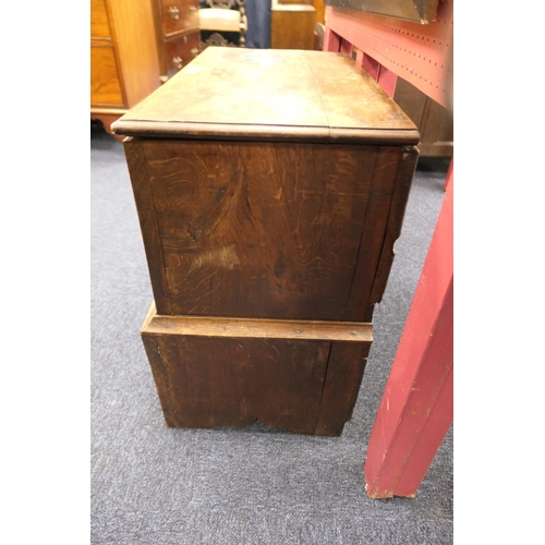 919 - Oak joined cofferbach, 19th Century, with lift up lid over a three recessed panel front, single long... 