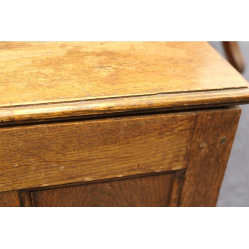 919 - Oak joined cofferbach, 19th Century, with lift up lid over a three recessed panel front, single long... 