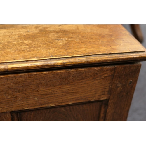 919 - Oak joined cofferbach, 19th Century, with lift up lid over a three recessed panel front, single long... 