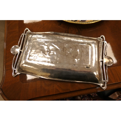 177 - Art Nouveau silver plated pewter tray, rectangular form, worked in low relief with a girl holding a ... 