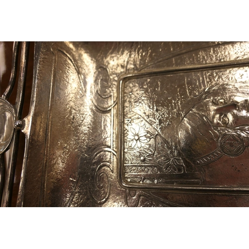 177 - Art Nouveau silver plated pewter tray, rectangular form, worked in low relief with a girl holding a ... 