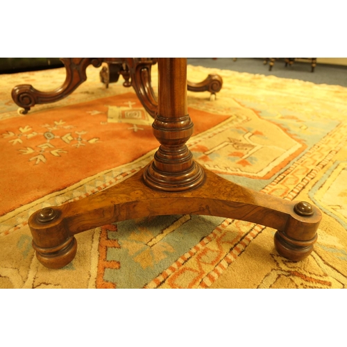 916 - Victorian burr walnut reading table, circa 1860, circular top over a turned column and a galleried c... 