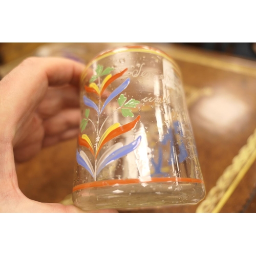 76 - Dutch enamelled glass beaker, 18th or 19th Century, cylinder form decorated with a merchant man and ... 