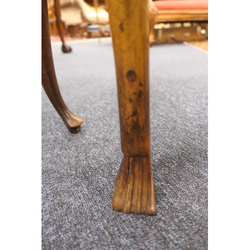 884 - Walnut side table, 18th Century with later restoration, the rectangular top with kick-in corners and... 