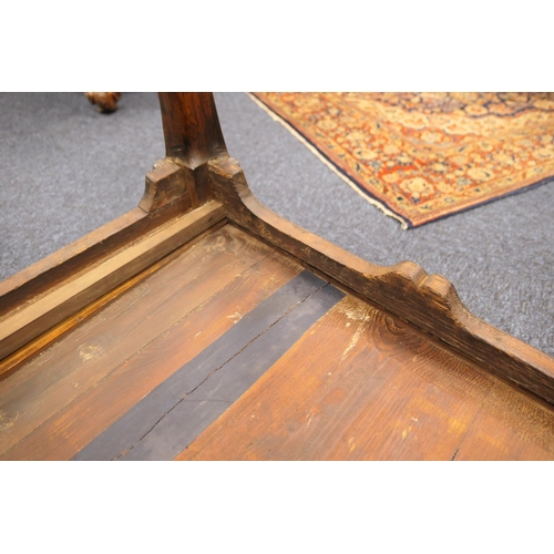 884 - Walnut side table, 18th Century with later restoration, the rectangular top with kick-in corners and... 