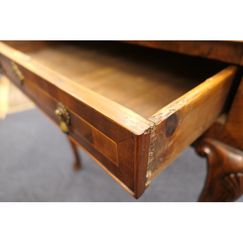 884 - Walnut side table, 18th Century with later restoration, the rectangular top with kick-in corners and... 