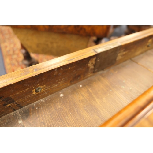 884 - Walnut side table, 18th Century with later restoration, the rectangular top with kick-in corners and... 