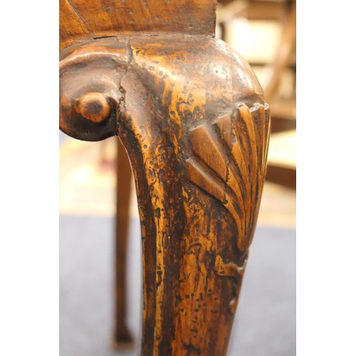 884 - Walnut side table, 18th Century with later restoration, the rectangular top with kick-in corners and... 