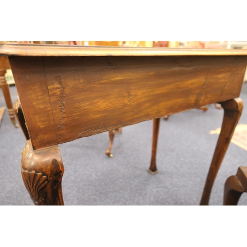 884 - Walnut side table, 18th Century with later restoration, the rectangular top with kick-in corners and... 