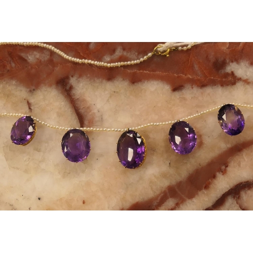 299 - Amethyst and seed pearl choker necklace, having five oval amethysts, the largest 17mm x 13mm, all mo... 