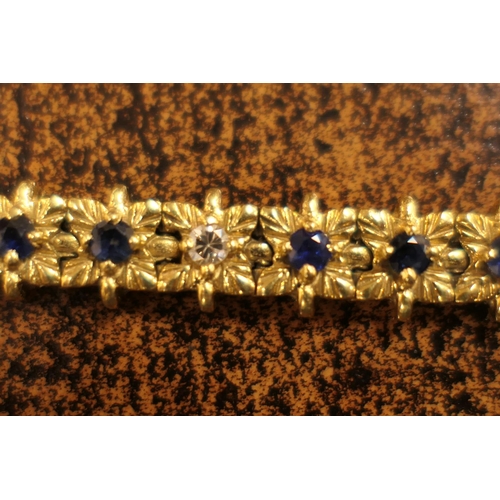 378 - Sapphire and diamond line bracelet, set with seven small round brilliant cut diamonds, dispersed wit... 