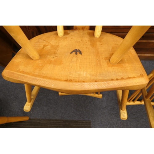 912 - Pair of hand crafted ash and elm comb back Windsor chairs, shaped seat and urn legs with H-stretcher... 