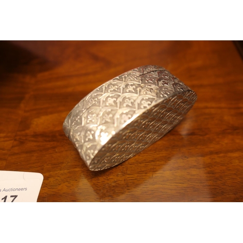 217 - Continental white metal elliptical snuff box, indistinctly marked, decorated with a scale like desig... 