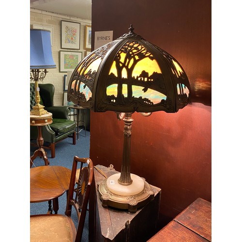 686 - Decorative stained glass and metal table lamp, in Edwardian Art Nouveau style, the shade worked with... 