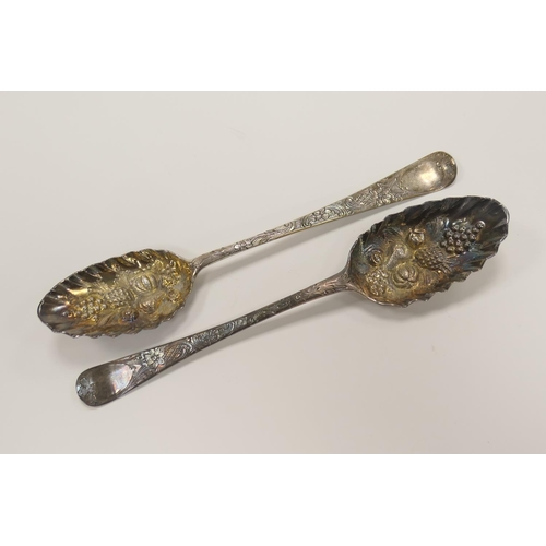 332 - Pair of George III silver and later engraved gilded berry spoons, date marks indistinct, weight 115g