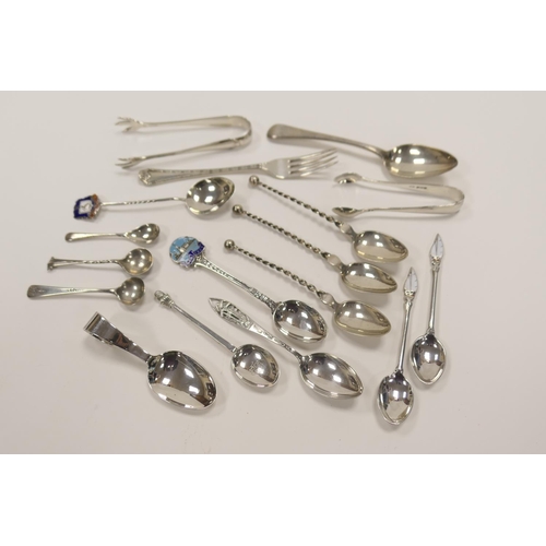 338 - Assorted silver spoons, silver dessert fork, two pairs of silver sugar tongs, gross weight approx. 1... 