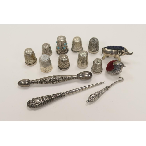 341 - Sterling silver novelty bodkin case, eight silver thimbles including two by Charles Horner, two silv... 