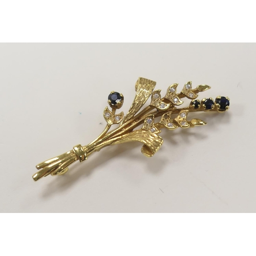 375 - 9ct gold sapphire and white stone floral spray brooch (one stone deficient), 50mm, gross weight appr... 