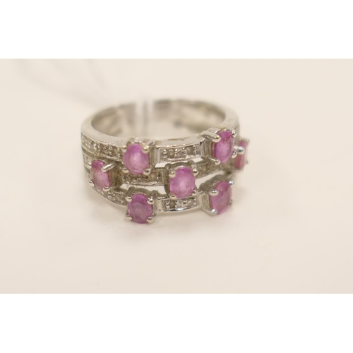 393 - Pink sapphire and diamond trinity ring in 14ct white gold, ring size N, gross weight approx. 5g