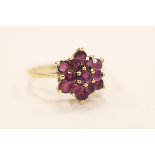 402 - Ruby cluster ring in 9ct gold, ring size N, gross weight approx. 2.7g