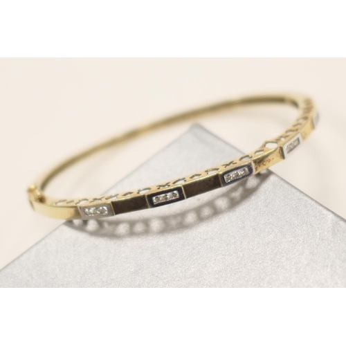 410 - Diamond set hinged bangle in 9ct two colour gold set with 15 tiny round cut diamonds, cuff size  60m... 